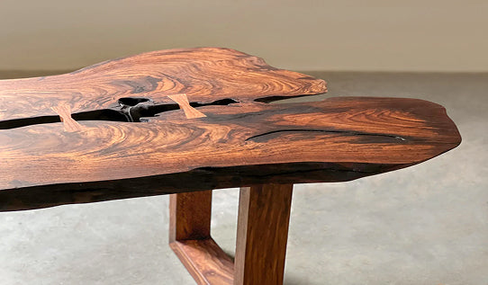 Left to right: solid wood throughout, a real-wood veneer over plywood, and a printed laminate over engineered board.